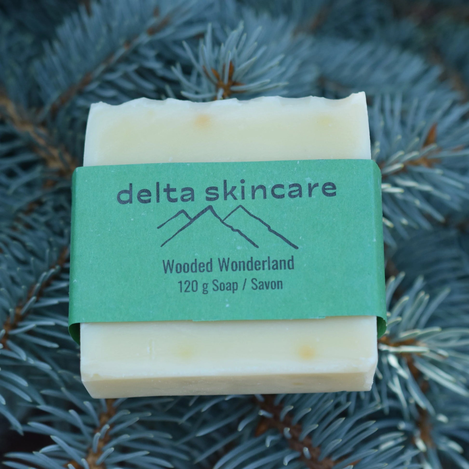 Delta Skincare Wooded Wonderland natural soap bar on pine branches
