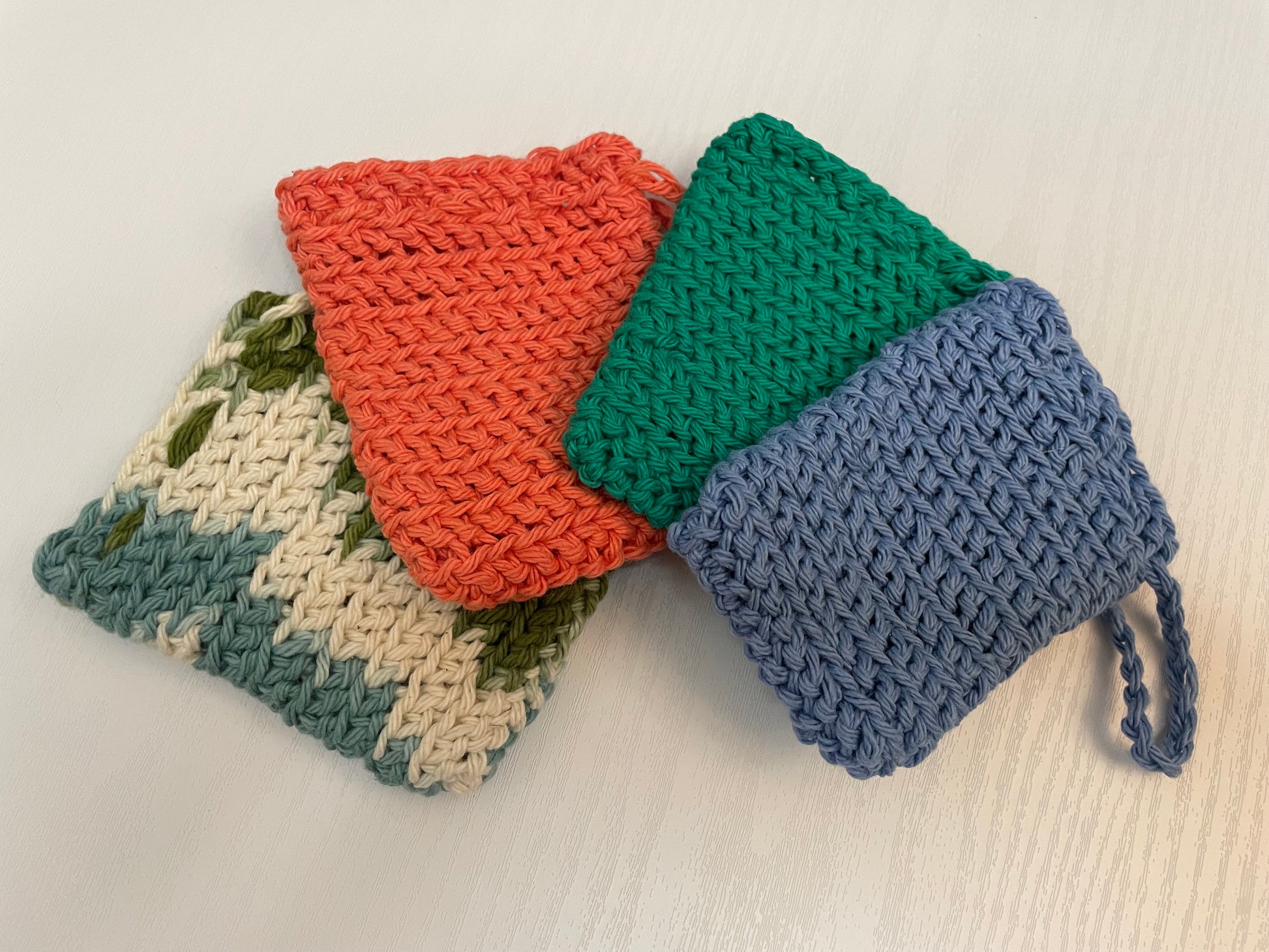 four crochet soap savers