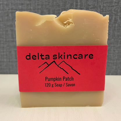 Delta Skincare Pumpkin Patch soap bar with red label on a white surface